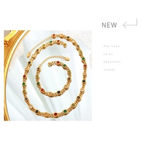 Detail of 18K gold plated necklace and bracelet set with colorful zircon stones