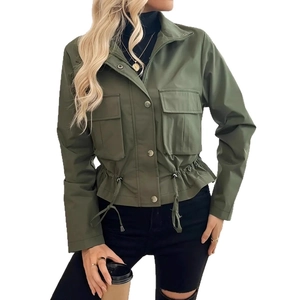 Detail of army green utility jacket featuring drawstring waist and functional cargo pockets
