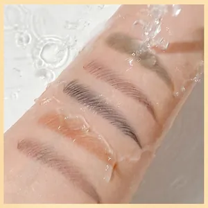 Waterproof double-ended eyebrow pencil swatches on skin showing various natural shades