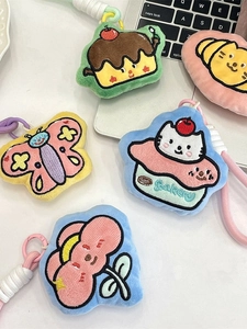 Cartoon plush keychains set featuring cupcake, flower and butterfly with bakery embroidery