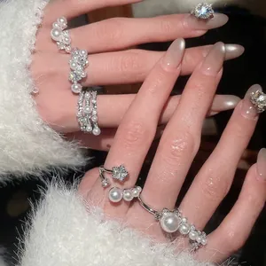Elegant Korean style open ring featuring pearls and zircon stones on a silver metal band
