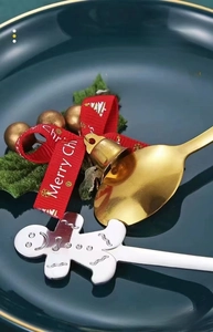 Detail of Christmas gingerbread man stainless steel spoon with a mirror polished finish