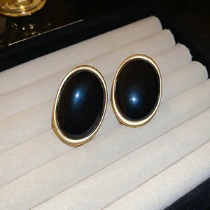 Boucles d'oreilles ovales vintage dorées avec résine noire brillante en écrin cadeau