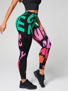 Close-up of high-waisted graffiti print yoga leggings with seamless butt lifting design