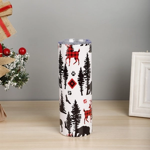 Detail of 20oz Christmas tumbler with red plaid reindeer and forest animal patterns