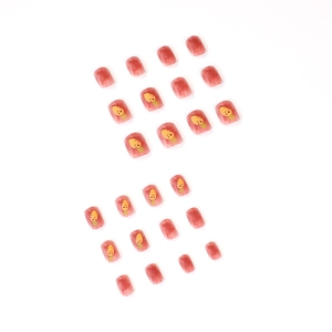 Cute gradient pink press-on nails with cartoon carrot designs in short square shape