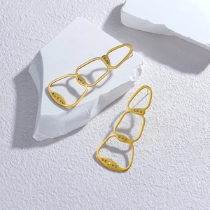 Irregular geometric 18K gold stainless steel earrings with zircon inlay on white stone