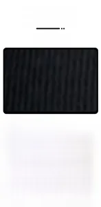 Close-up of seamless black one-piece yoga bodysuit with breathable ribbed knit fabric