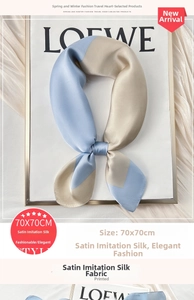 Detail of 70x70cm blue and beige satin silk scarf showing smooth texture and sheen