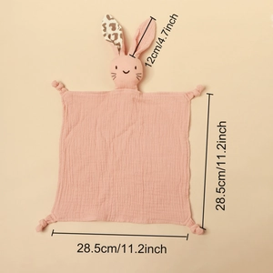 Pink muslin baby comforter with bunny ears and dimensions marking of 28.5cm by 12cm