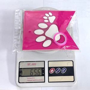 Pink dog paw print birthday bunting banner set with pink ribbon in 65g packaging