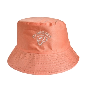 Detail of coral orange cotton bucket hat showing quality embroidery and fine stitching