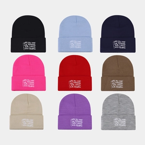 Knitted beanie with letter embroidery in nine colors like black, blue and brown