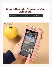 Detail of pink PU leather phone crossbody bag with transparent touch screen window and gold zipper