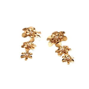 Elegant gold layered flower drop earrings with white pearls and polished metallic finish