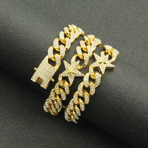Gold iced-out Cuban link bracelet with sparkling star charm and iced box clasp for hip hop style