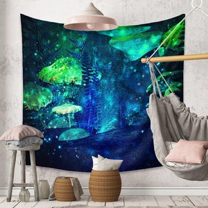 Detail of bohemian mushroom forest tapestry displayed in a cozy, modern living room