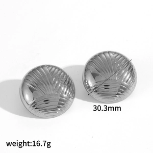 Minimalist silver stainless steel round hoop earrings with sunburst pattern texture