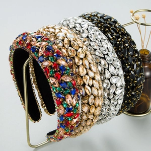 Detail of four Baroque crystal headbands with sparkling rhinestones on a display stand