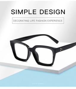 Detail of black square glasses frame with gold triple rivets on geometric display