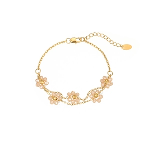 Elegant gold chain bracelet with five champagne beaded flowers and adjustable clasp