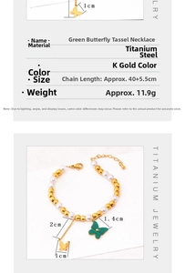 Detail showing titanium steel necklace specs with green butterfly and pearl tassel charms