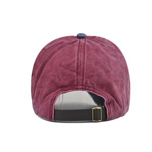 Detail of vintage washed cotton baseball cap with adjustable metal buckle and strap