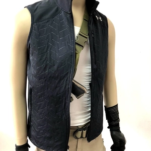 Detail of black tactical sling chest bag with textured surface and heavy-duty zipper closure