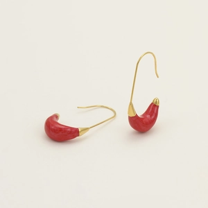 Macro detail of red marble resin C-shape earrings with elegant 18K gold metal ear hooks