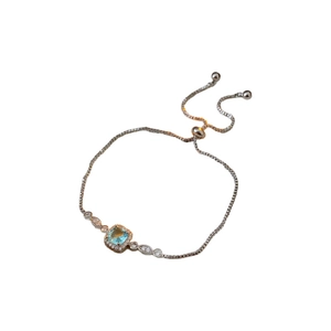 Silver bracelet featuring light blue square zircon and adjustable chain with fine detailing