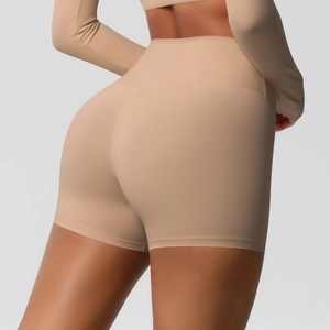 Rear view of high-waisted nude yoga shorts featuring seamless fit and booty lifting effect