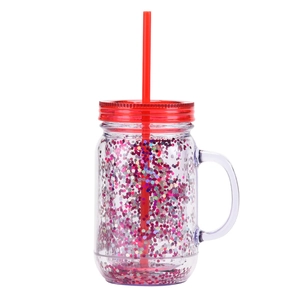 Detail view of double-walled plastic mason jar with glitter and red straw handle