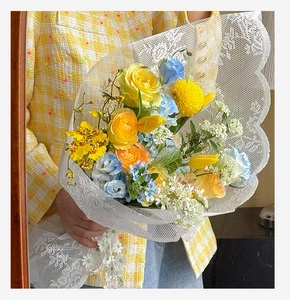 Close-up of waterproof lace mesh fabric for DIY flower bouquet wrapping and craft materials