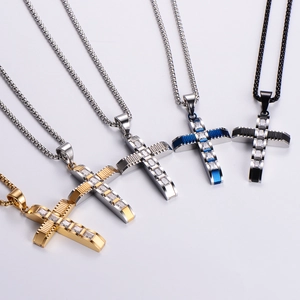 Five colored hip hop cross necklaces with cubic zirconia on a white background