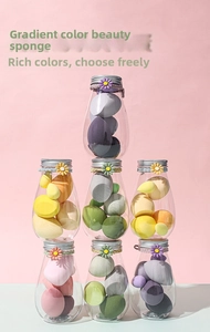 Gradient color beauty blender set in transparent droplet jars with daisy charm