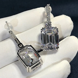 Luxurious emerald cut cubic zirconia earrings with micro-paved silver drop design