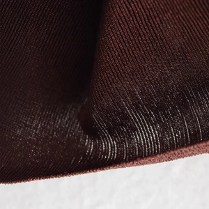 Elegant dark brown lace-up straight pants with a soft knitted fabric texture