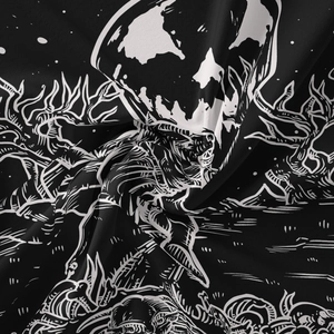 Close-up of black and white gothic tapestry featuring skull and thorn patterns