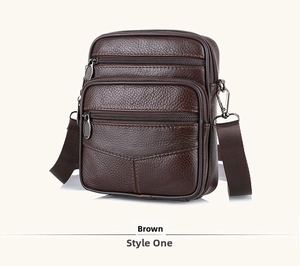 Detail of coffee brown leather crossbody bag featuring lychee texture and multiple zippers