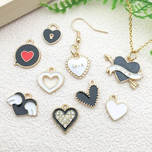 Mix of black and white heart wing alloy charms for DIY jewelry making accessories