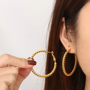Elegant 18K gold plated stainless steel twisted rope hoop earrings for a modern minimalist look