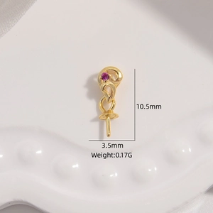 Macro detail of S925 sterling silver gold pendant pin with zircon and purple stone