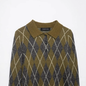 Men's olive green and dark grey argyle knit polo shirt with long sleeves and classic lapel