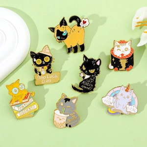 Close-up of 7 cute cartoon cat enamel pins featuring funny puns on a pastel green surface