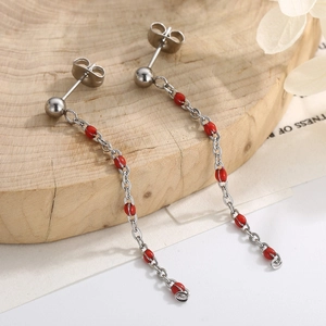 Long silver chain tassel earrings featuring elegant red transparent beads and studs