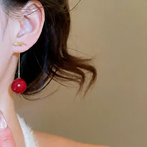 Elegant cherry drop earrings with red resin beads and gold leaf hooks for women