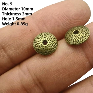 Detail view of 10mm antique bronze spacer bead showing 3mm thickness and 1.5mm hole