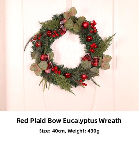 Detail of a 40cm Christmas wreath with eucalyptus, red berries, and a plaid bow