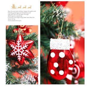 Detail of red Christmas star and glove ornaments with white snowflake and polka dot patterns