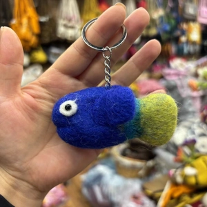 Handmade wool felt octopus fish keychain in deep blue and yellow-green gradient design